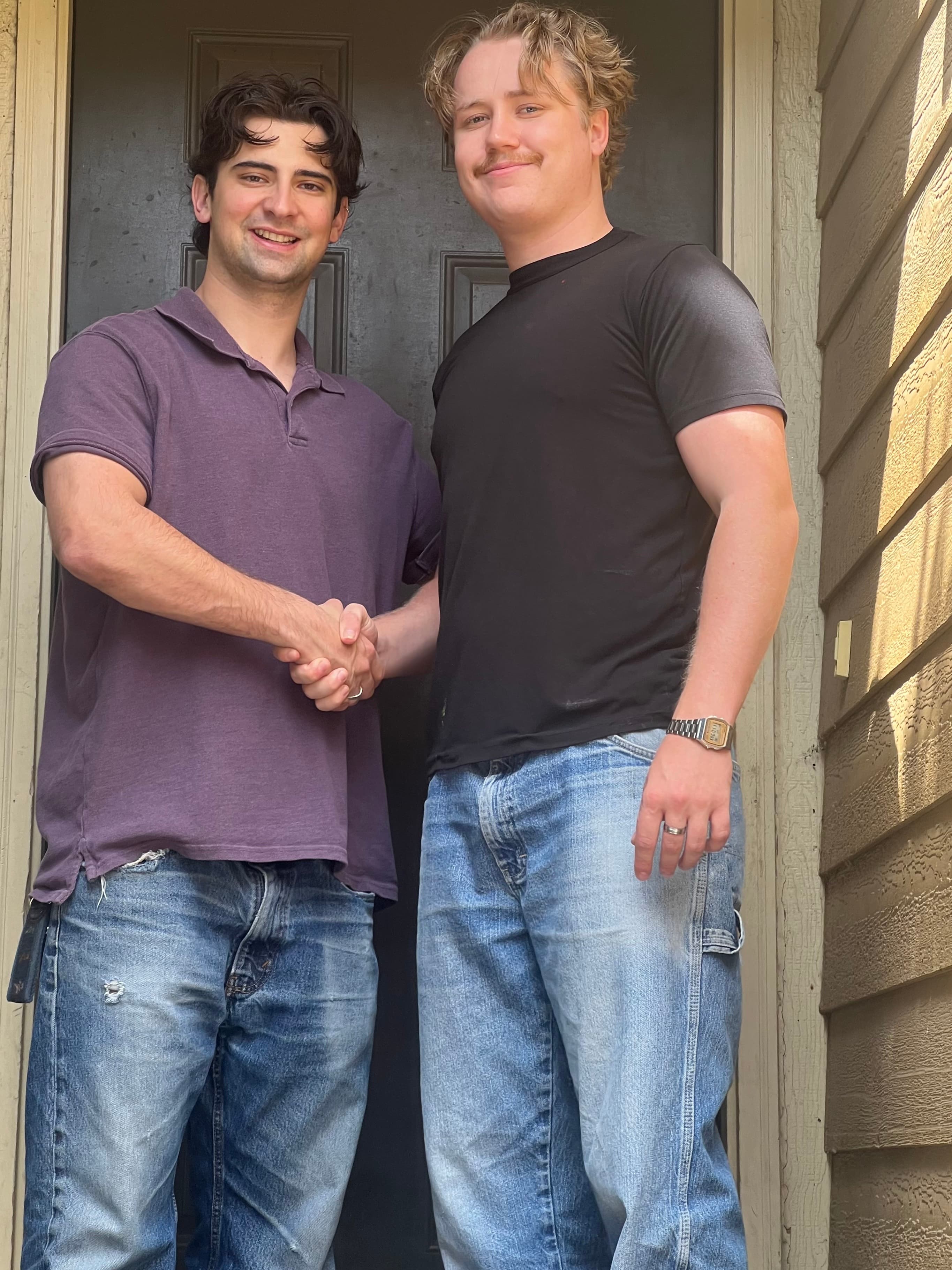 Vanish Moving Co. founders Cole and Spencer standing outside moving job